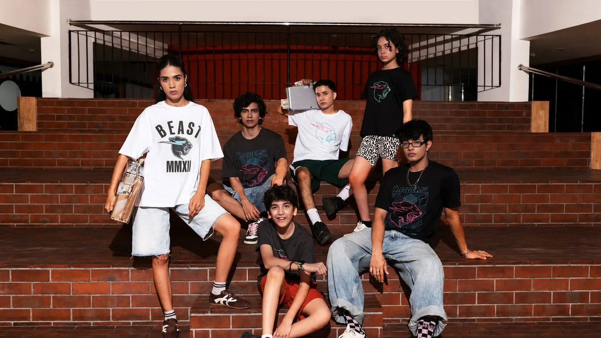 MrBeast MMXII varsity panther tee worn on brick steps
