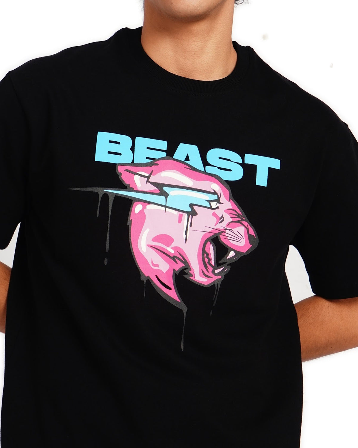 Official MrBeast Drip Panther T-shirt in black, close-up of the pink drip panther chest graphic