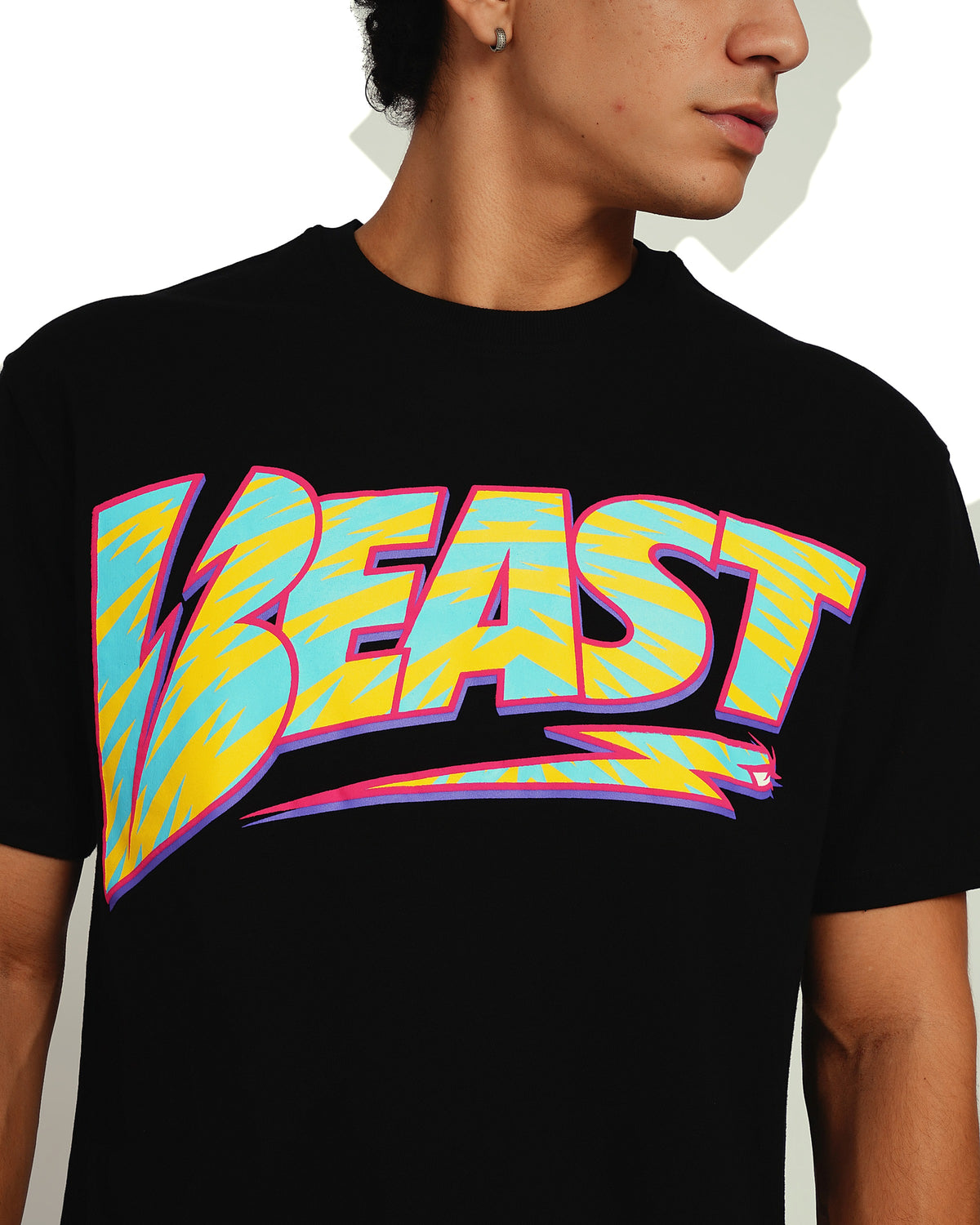 Official MrBeast Retro Beast T-shirt in black, close-up of the puff-print BEAST lightning bolt graphic